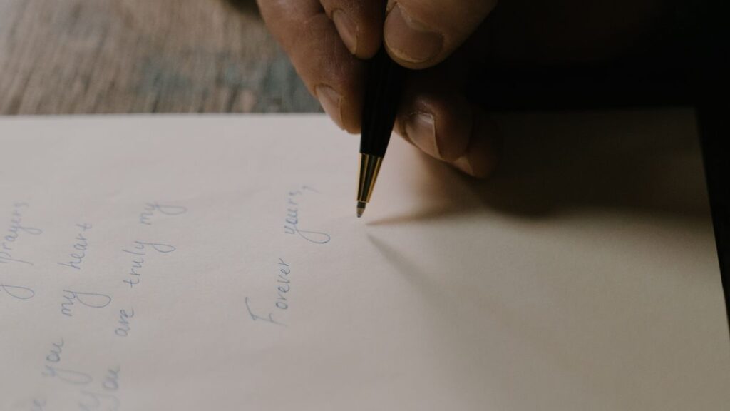 Application for sick leave written by hand on white paper